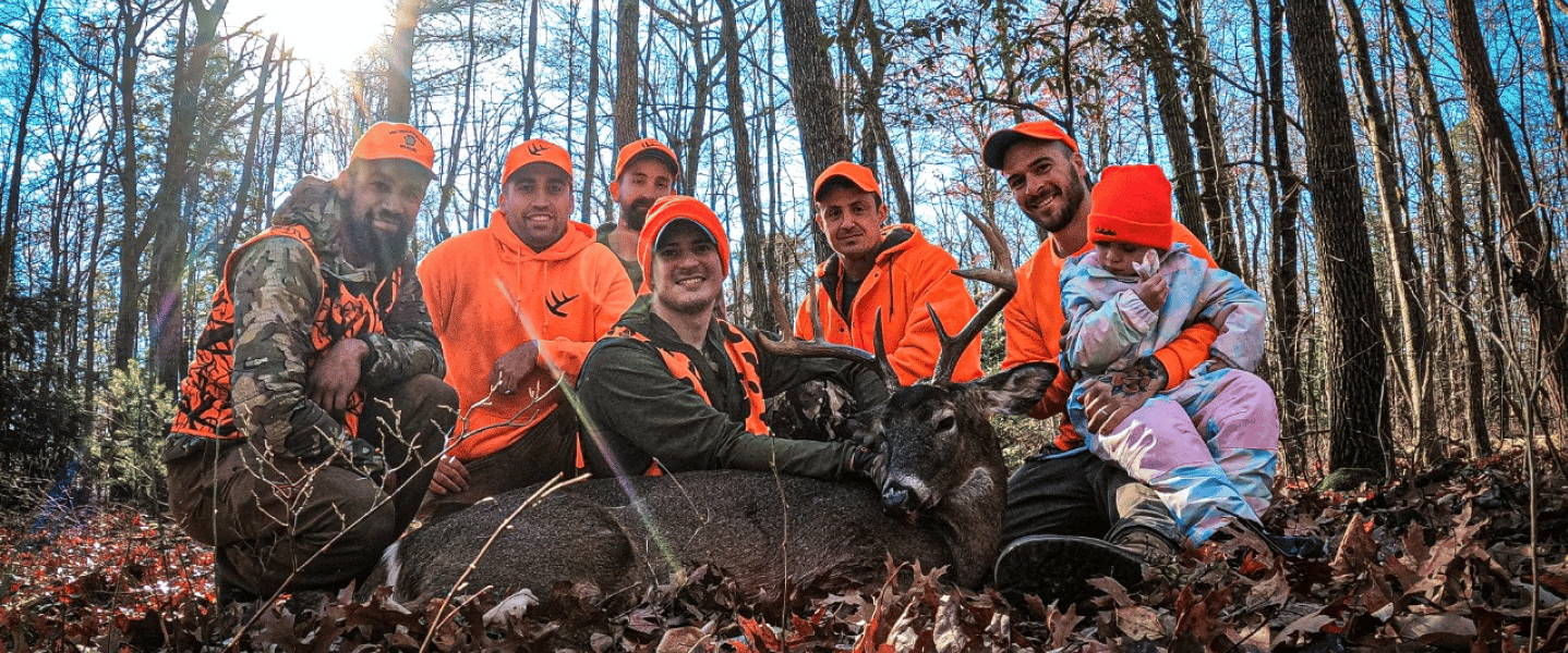 Family of Hunters in Woods